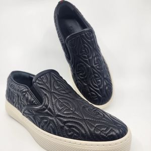 gucci black mens leather gg-embossed slip-on sneakers